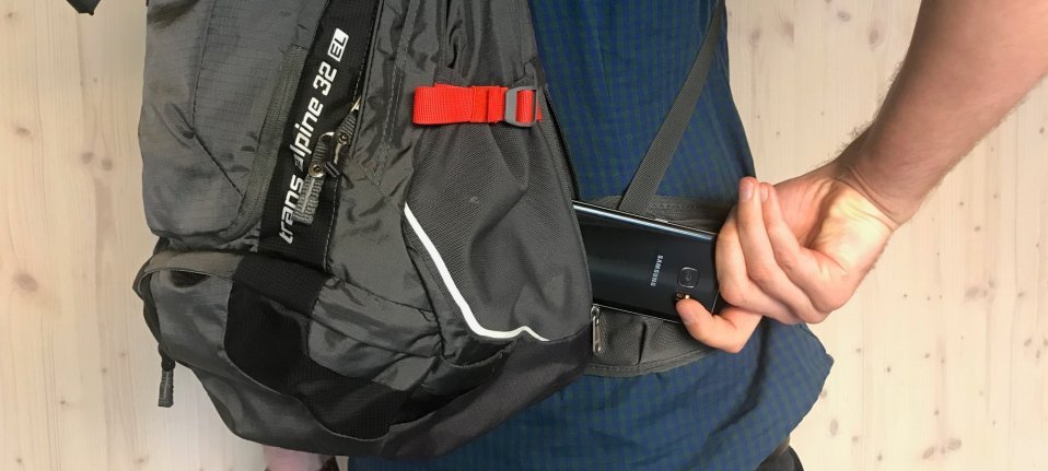 The cell phone pouch is easy to reach.