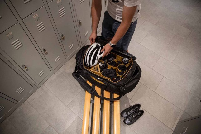 Helmets of different sizes and shapes can all find a secure place in the RoundTrip Duffel. No scratches, no dents!