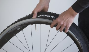 Place the rim with the CushCore foam inside of the tyre.