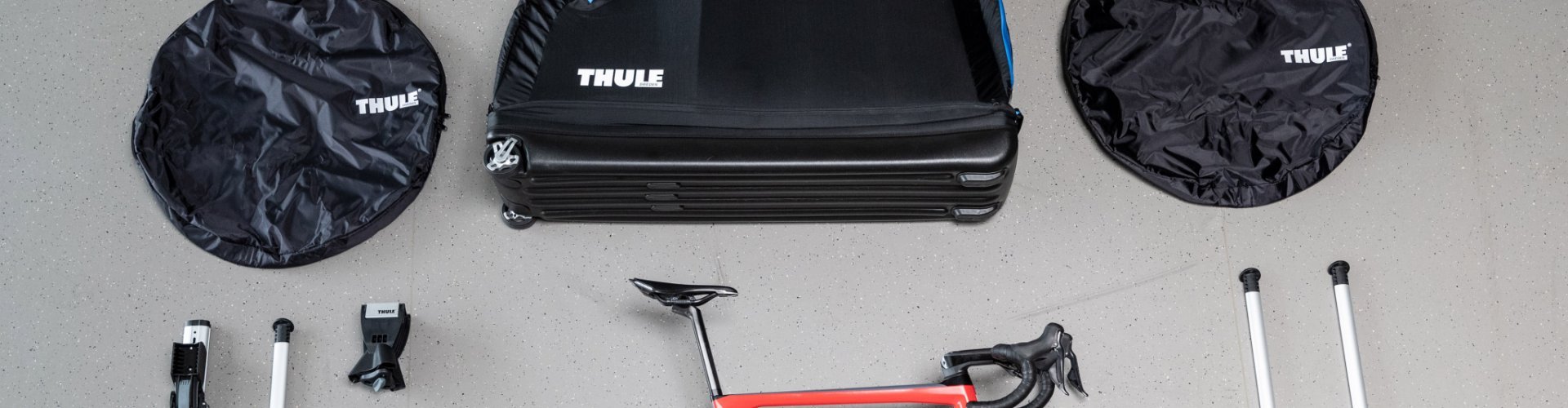 Softshell bike case with integrated work stand that makes travelling by bike a breeze.