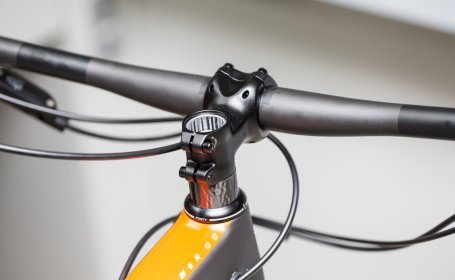 The steerer tube should be at least 1 mm lower than the top of the stem.