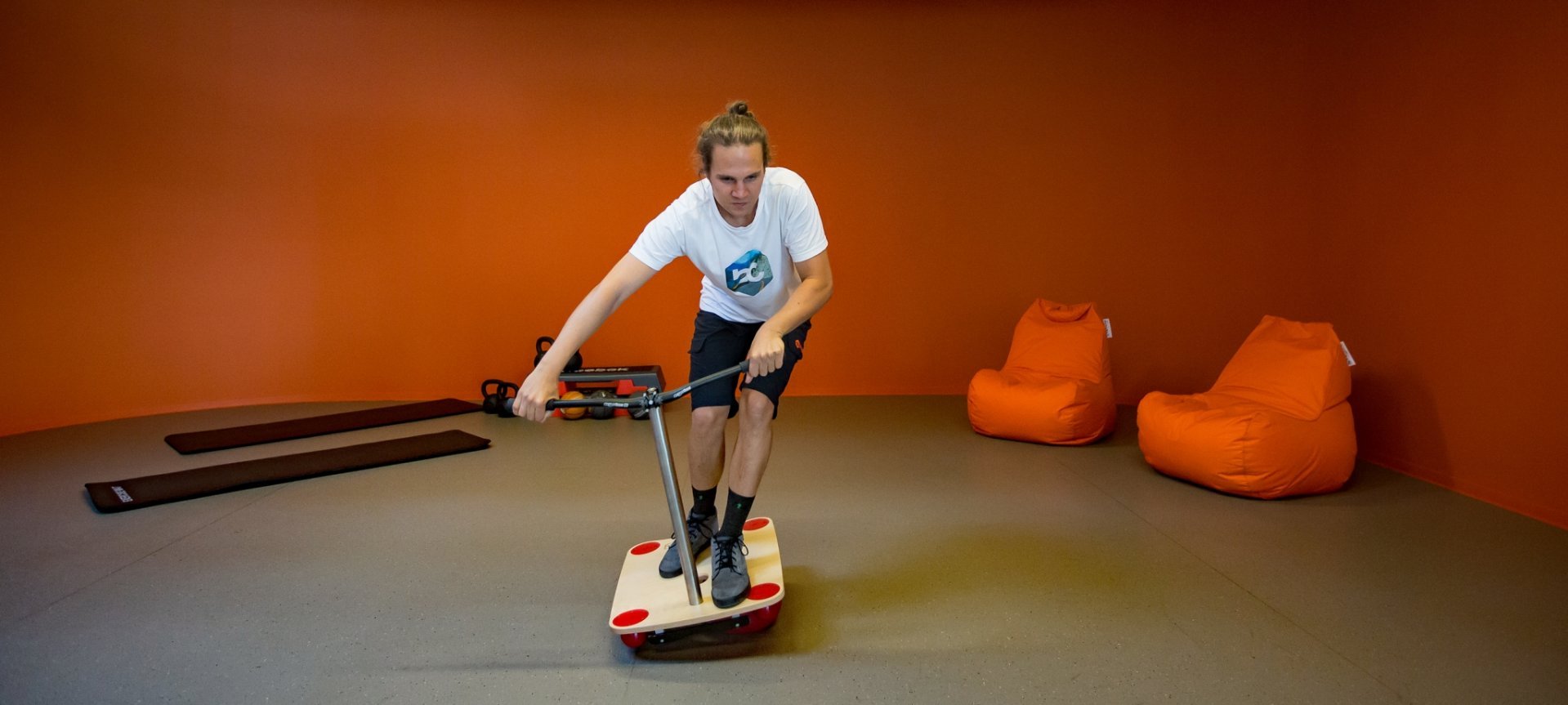 Christoph riding the TOGU Bike Balance Board.