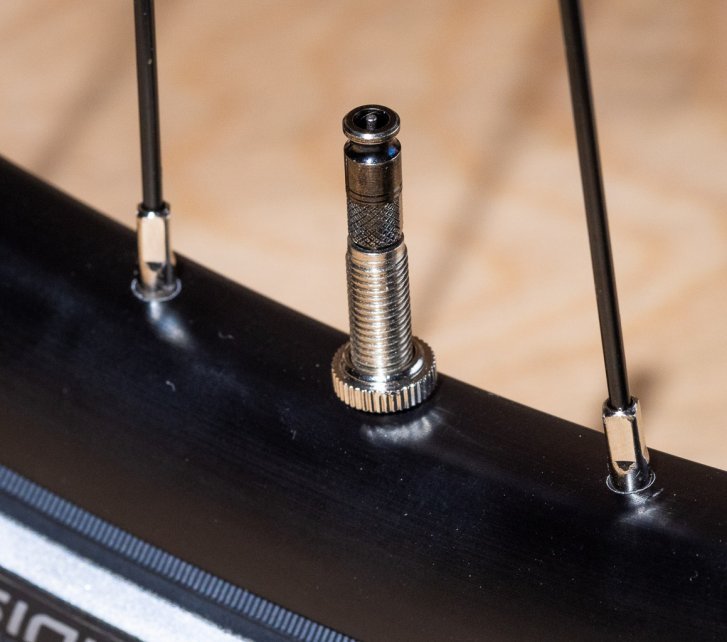 Detail photo: A Schwalbe Clik-Valve installed in a bicycle rim