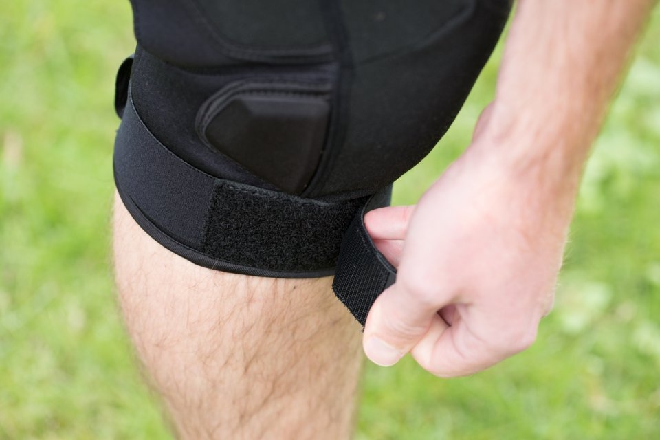 Most knee guards use Velcro straps.