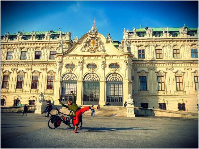 Jörg celebrating arrival in Vienna in front of Belvedere Palace