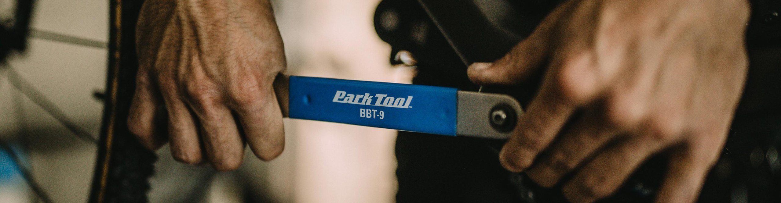 Park Tool BBT-9 bike tool used on a bicycle bottom bracket during maintenance – professional bicycle repair and workshop tool