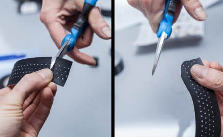 Zurechtschneiden des extra Stücks Lenkerband.