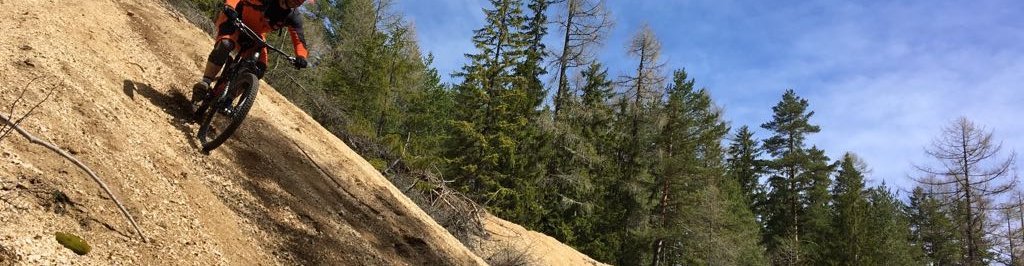 Surfing down a loose gravel grade.