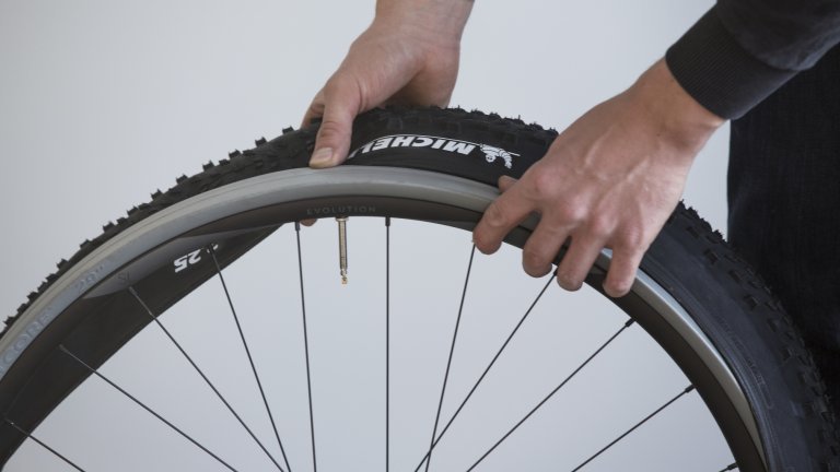 Place the rim with the CushCore foam inside of the tyre.