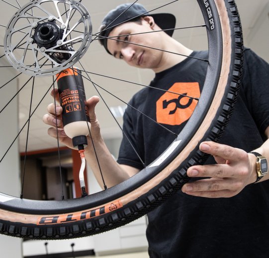 Tyre sealant is inserted into the tyre via the tubeless valve.