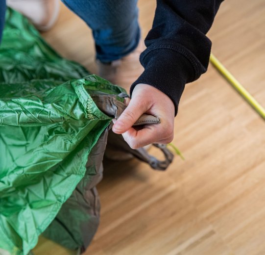 A close-up of the outer tent. Shown is the seam near the loop for a peg.