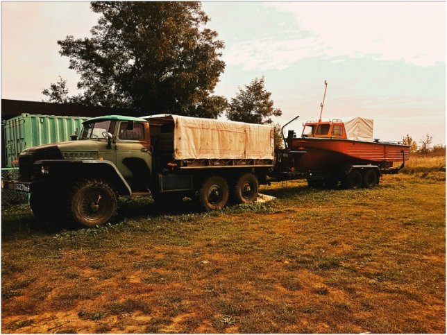 An oldschool IFA W50 with boat trailer