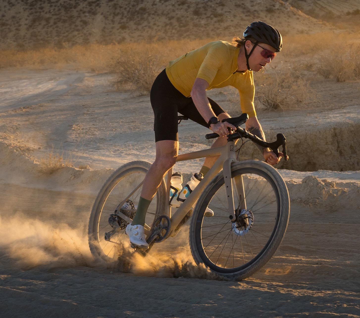 Discover Shimano offers with a cyclist on a dusty trail as a hero image for discounted Shimano products