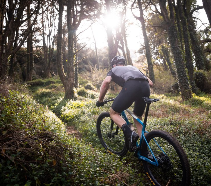 Training with his hardtail - racing with his full-suspension bike.