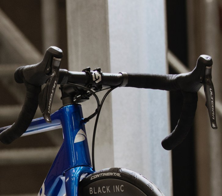 A Shimano Ultegra Di2 shift lever is mounted on a Factor One. The Junction A box is mounted underneath the stem.