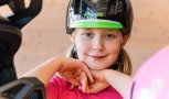 How do I properly put a bike helmet on my kid?