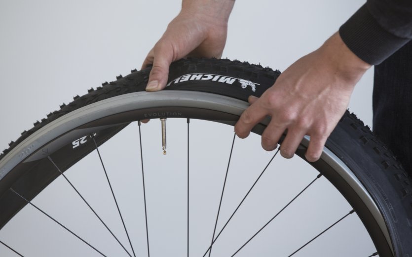 Place the rim with the CushCore foam inside of the tyre.