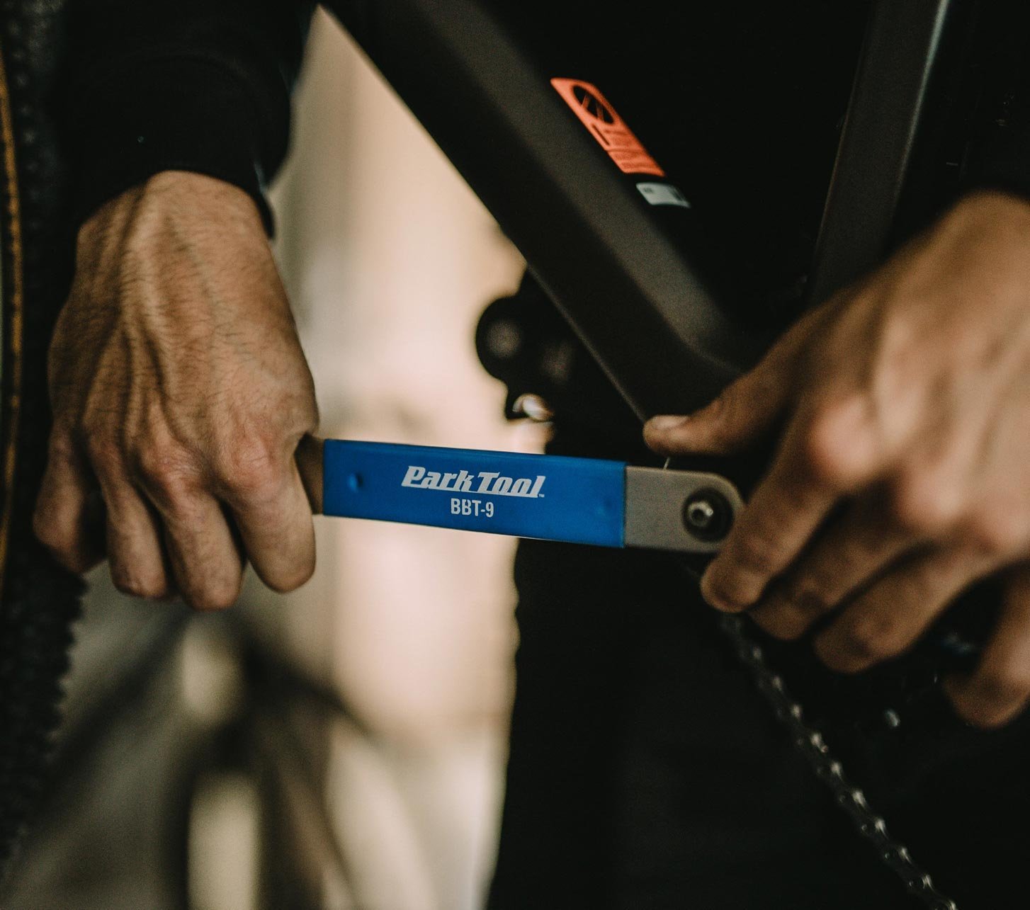Park Tool BBT-9 bike tool used on a bicycle bottom bracket during maintenance – professional bicycle repair and workshop tool