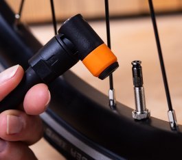 Macro photo: A Schwalbe Clik-Valve on a bicycle