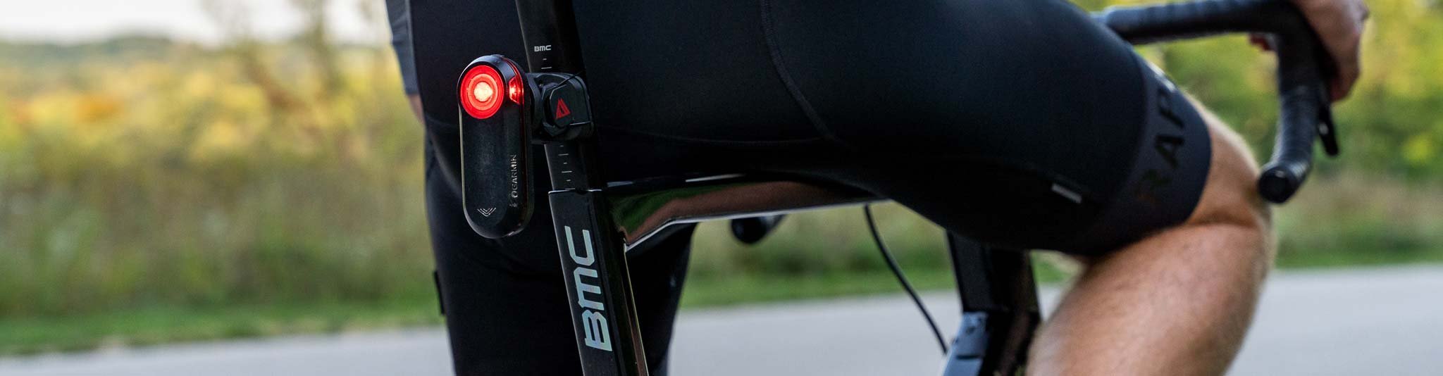 KOM Cycling mount for Garmin Varia radar with mounted rear light on a road bike for improved visibility and safety