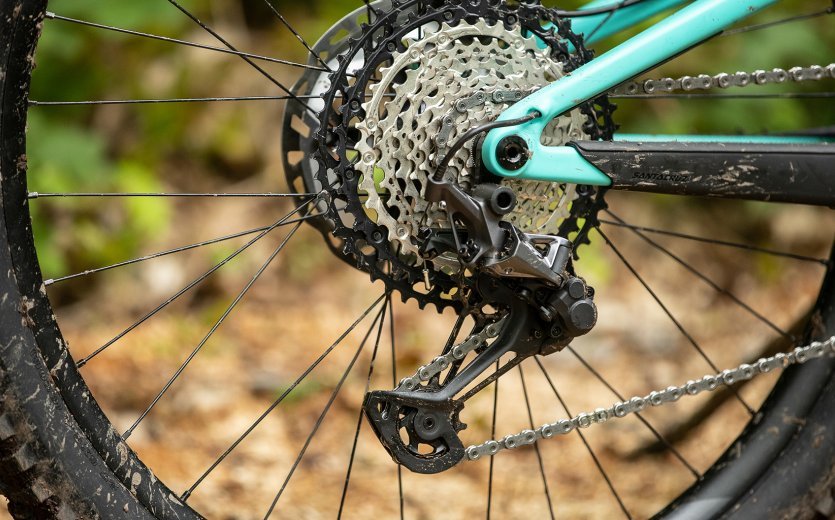 A Shimano XT mechanical rear derailleur is shown on a Santa Cruz bike.