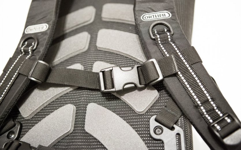 Shoulder straps and breast strap of a backpack.