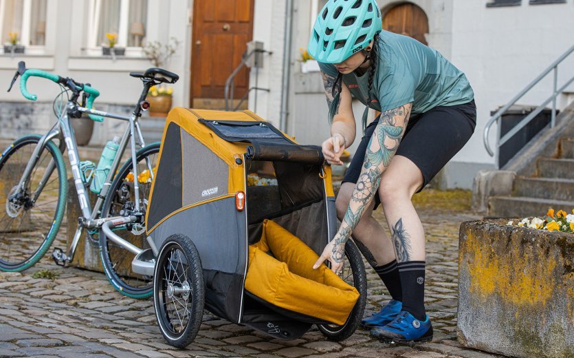 The optional dog bed gives the suspension-less trailer some light padding.