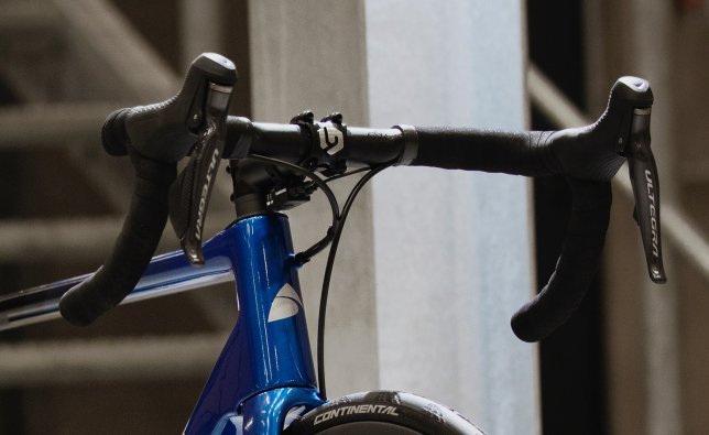 A Shimano Ultegra Di2 shift lever is mounted on a Factor One. The Junction A box is mounted underneath the stem.