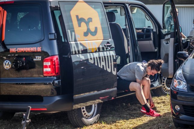 The bc van serves as a rolling locker room and workshop.