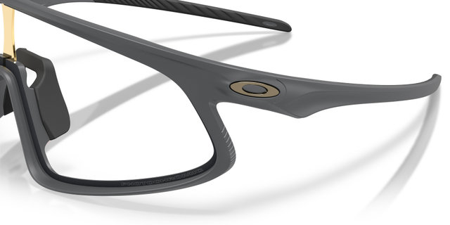 Oakley Lunettes de Sport RSLV 141 - matte carbon | clear to black iridium photochromic