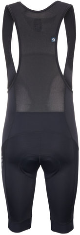 Culotes con tirantes Essence Bib Shorts Trägerhose - black/M