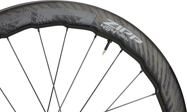 Zipp Rueda 454 NSW Carbon Tubeless Disc Center Lock - M. f. de producción - matte black-gloss black/28" RT 12x142 Shimano