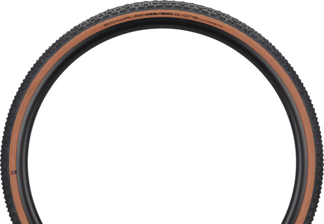 Cubierta plegable G-One Ultrabite Performance ADDIX RaceGuard 28" - negro-bronze skin/40-622 (700x40C)